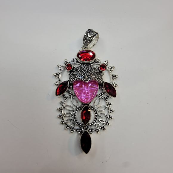 Sterling Silver Pendant with Pink Carved Face and Garnet Accents - Picture 2 of 10